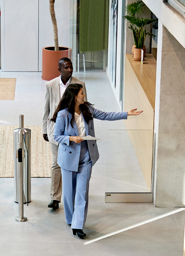 Real estate agent showing a property to a client